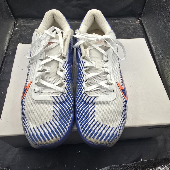 Nike White and Blue Athletic Shoes with Orange Accents